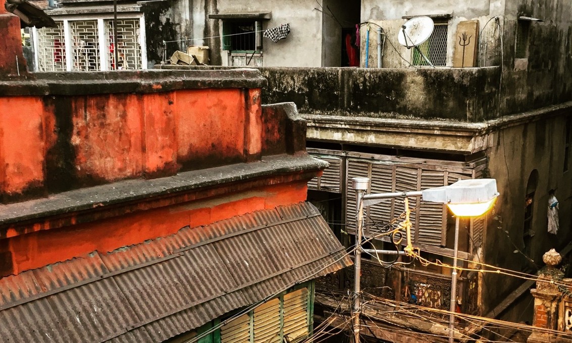An old street in Calcutta, showing how the buildings weather with the paint blackening due to the heat and humidity