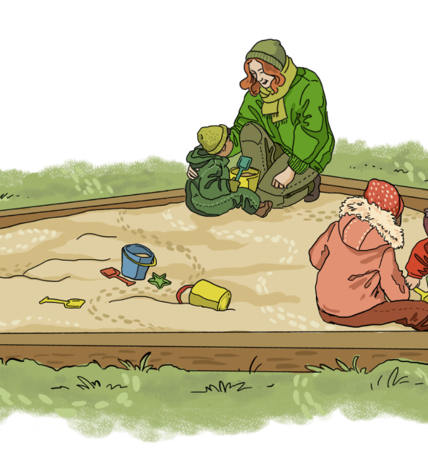 Barn som leker i en sandkasse 