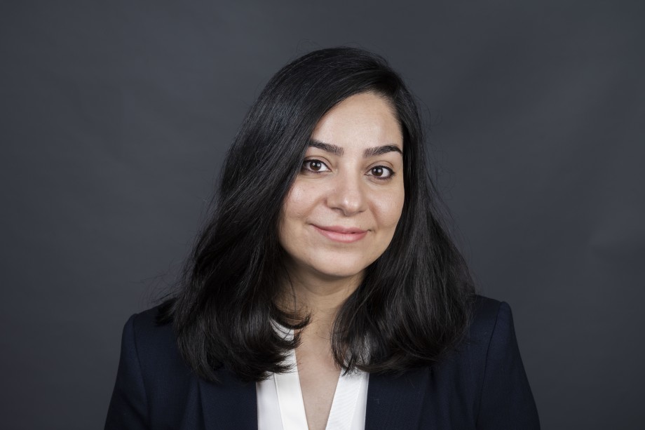 Portrait of a young woman in a suit 