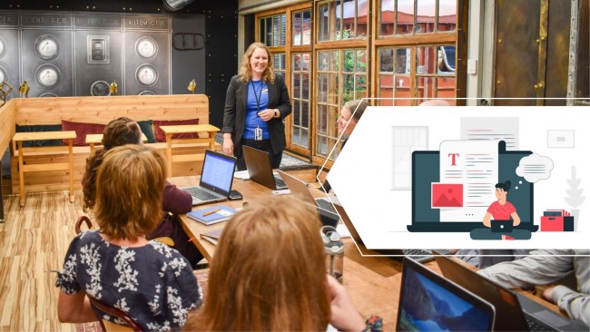 Kvinne underviser for en gruppe i Dataverkstedet